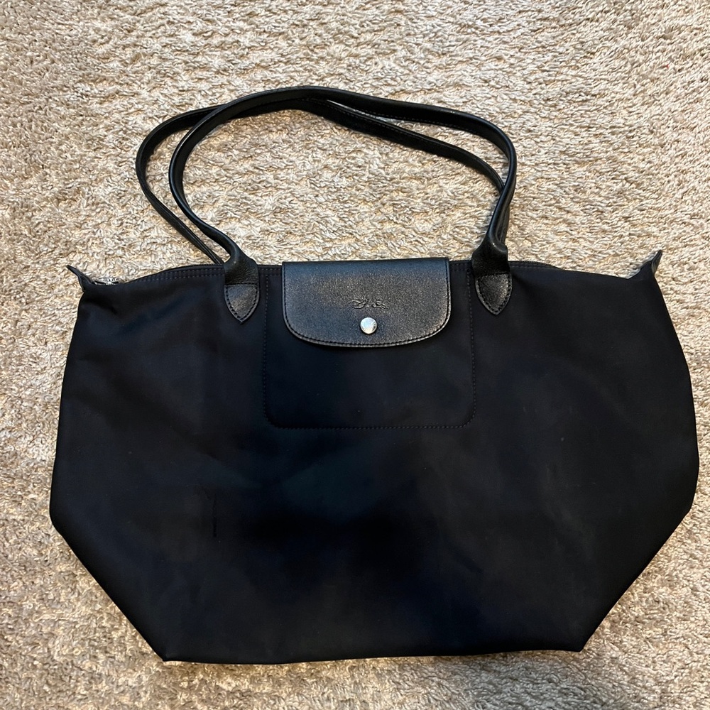 Used long champ tote bag